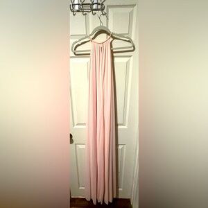 Pink halter open back maxi dress.